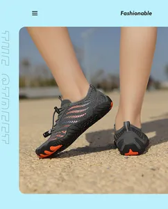 Kids quick-dry water shoes with gray mesh upper, orange stripes and anti-slip rubber soles