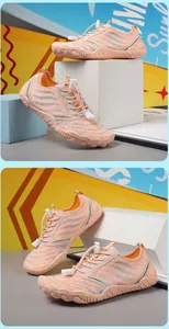 Detail of pink kids water shoes showing quick-pull laces and anti-slip rubber outsole