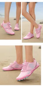 Pink quick-dry beach shoes for women featuring breathable mesh and non-slip blue soles