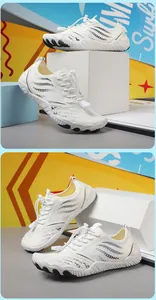 Detailed view of white quick-dry water shoes with breathable mesh and wave patterns