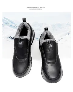 Detail of warm plush lining and matte leather upper on black winter snow boots