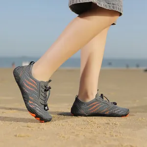 Grey and orange kids' quick-dry water shoes with non-slip rubber soles for beach play