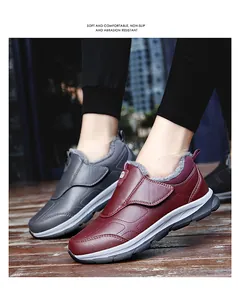Detail of warm plush lining and velcro closure on waterproof faux leather casual walking shoes