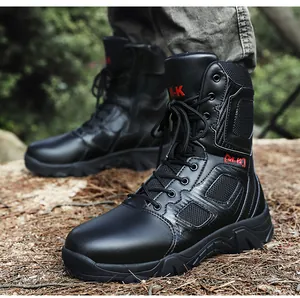 Detail view of black waterproof tactical boots with breathable mesh and M-K branding
