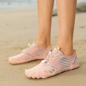 Pink quick-dry barefoot water shoes for swimming and beach activities with anti-slip rubber sole