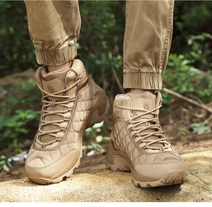 Outdoor desert boots with thick rubber soles and non-slip texture on natural rocks