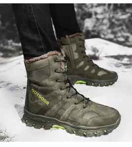 Close-up of military green tactical boots with warm faux shearling lining in the snow
