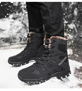 Detail of warm brown faux fur lining inside black tactical outdoor boots for winter snow