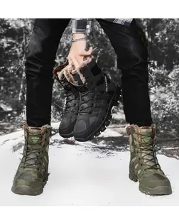 Detail of military green tactical boot with thick brown fleece lining for winter outdoor use