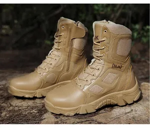 Close-up of khaki tactical boots with side zipper and rugged non-slip rubber soles