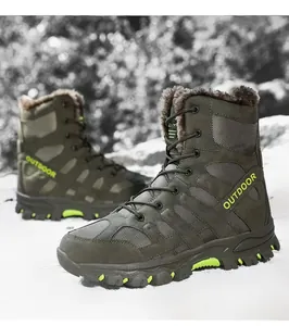 Close-up of winter tactical boots featuring thick faux fur lining and rugged rubber soles