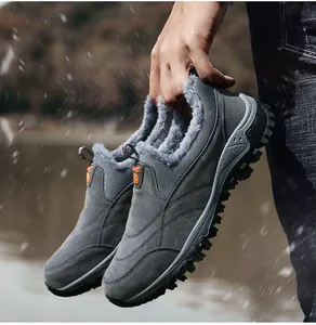 Close-up of warm faux fur lining and non-slip rubber sole on men's winter snow boots