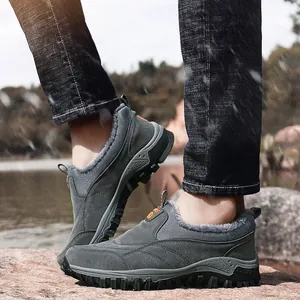 Men's grey slip-on snow boots with warm faux fur lining and rugged rubber sole for outdoors