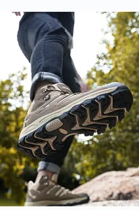 Macro shot of anti-slip rubber outsole on high-top hiking boots for outdoor traction