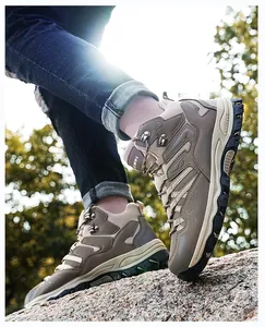 Outdoor hiking boot showing durable leather mesh surface and high-top ankle support