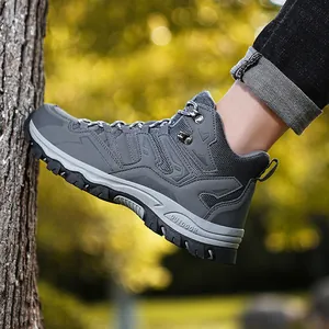 Grey outdoor hiking boots for couples with non-slip rubber soles and breathable mesh
