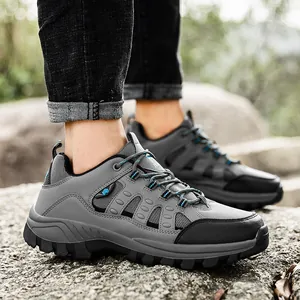 Men's high-top hiking boots with non-slip rubber soles for outdoor trekking and climbing