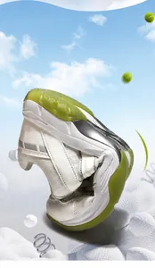 Macro shot of a flexible white athletic shoe bending easily to show soft sole flexibility
