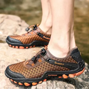 Brown breathable mesh outdoor hiking shoes for men with anti-slip rubber soles and quick laces