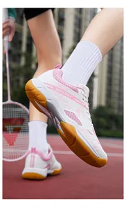 Chaussures de badminton pour femmes blanches et roses avec semelle en gomme sur terrain