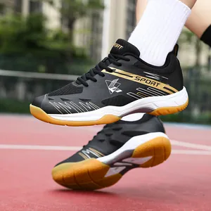 Chaussures de badminton et tennis noires et dorées avec maille respirante et semelle gomme