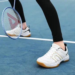 White indoor volleyball and badminton shoes with breathable mesh and gum rubber soles