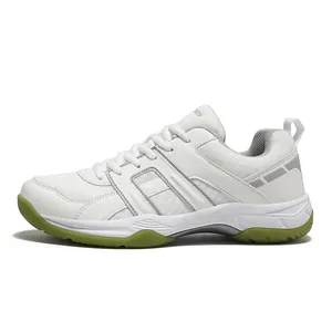 Non-slip court sports shoe for volleyball and badminton in white and grey with gum sole