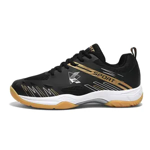 Chaussures de badminton noires et dorées avec mesh respirant et semelle antidérapante