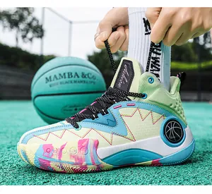 Detail of mint green basketball sneaker with colorful graffiti sole and yellow stitching