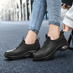 Women's black air cushion sneakers with breathable leather upper and slip-on design