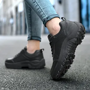Men's black outdoor hiking shoes with thick non-slip rubber soles and durable leather uppers