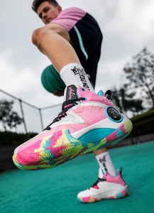 Detail of high-top basketball sneaker with multi-color stitching and marble pattern sole