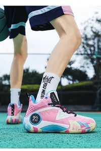 Detailed close-up of pink fashion basketball shoes with number 23 and marble texture sole