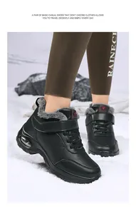 Détail de bottes d'hiver noires avec doublure en fourrure grise et semelle à coussin d'air