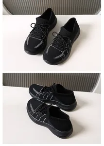 Dettagli di sneaker platform nere in mesh traspirante con cuciture bianche a onde