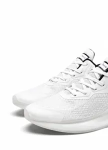 Detail of white breathable jacquard mesh and seamless welding on lightweight sneakers