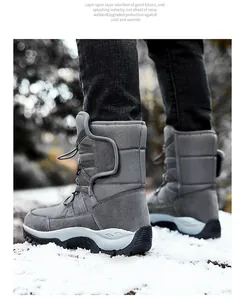 Detail of grey winter snow boots with anti-splash fabric and heavy-duty non-slip soles