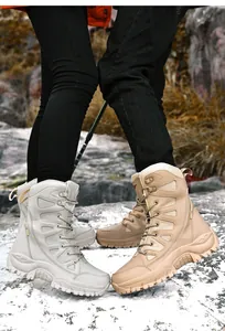 Detail of military boots showing sand color leather, side zipper and anti-slip rubber sole