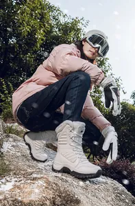 Detail of high-top winter desert boots with thick anti-slip soles for outdoor hiking