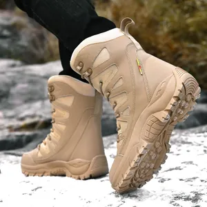 Men's khaki high-top tactical hiking boots with non-slip thick rubber soles on snow
