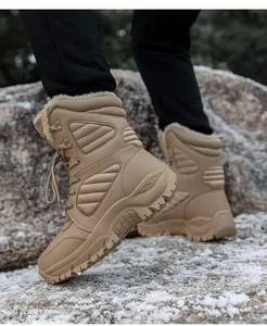 Detail of high-top desert boots with warm plush lining and rugged anti-slip soles