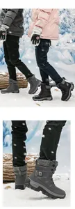 Close-up of durable high-top winter hiking boots with anti-slip soles for snowy terrains