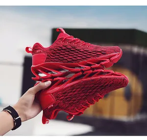Close-up of red breathable mesh sneakers with unique hollow mechanical cushioning soles