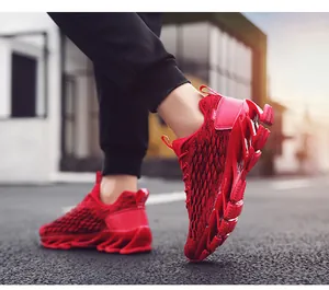 Close-up of red breathable knit sneakers featuring modern hollow blade cushioning outsoles
