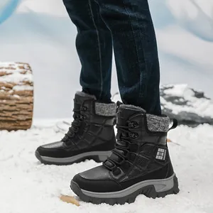 Black outdoor snow boots for couples with thickened lining on snowy background