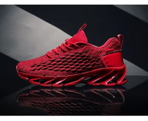 Detailed side view of red breathable mesh running shoe with blade hollow cushioning sole