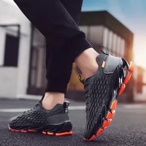 Men's breathable mesh running shoes in dark grey and orange with blade soles