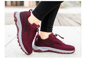 Close-up of breathable wine red mesh walking shoes with adjustable bungee laces