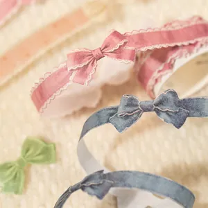 Retro bow-shaped washi tape set in pink, blue, and green for DIY journals and scrapbooking