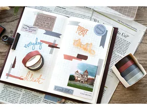 Close-up of four solid color washi tapes used in vintage journal scrapbooking
